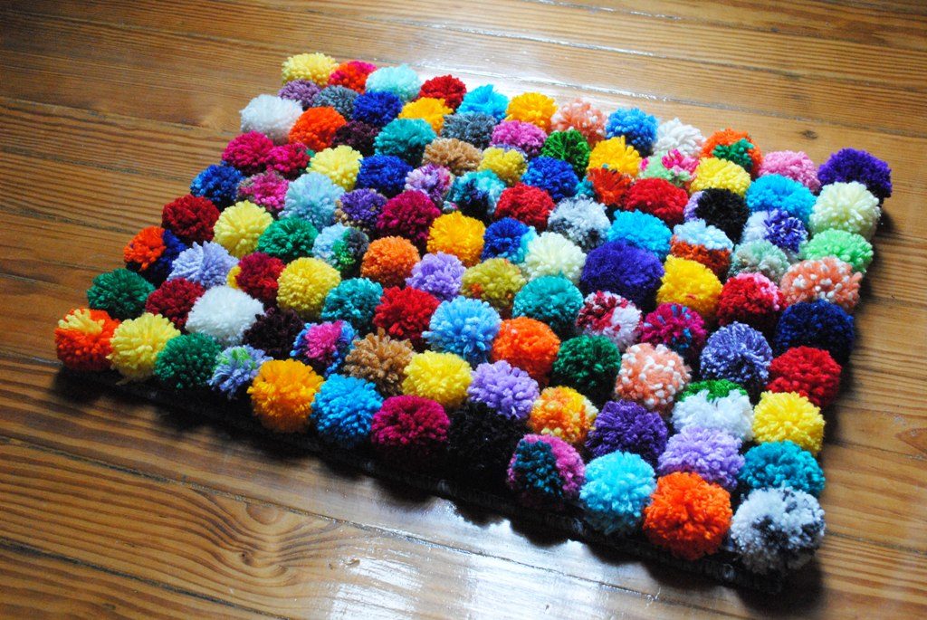 Alfombras con pompones